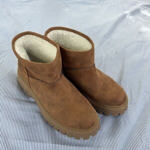 Dolce Vita shearling platform boots
